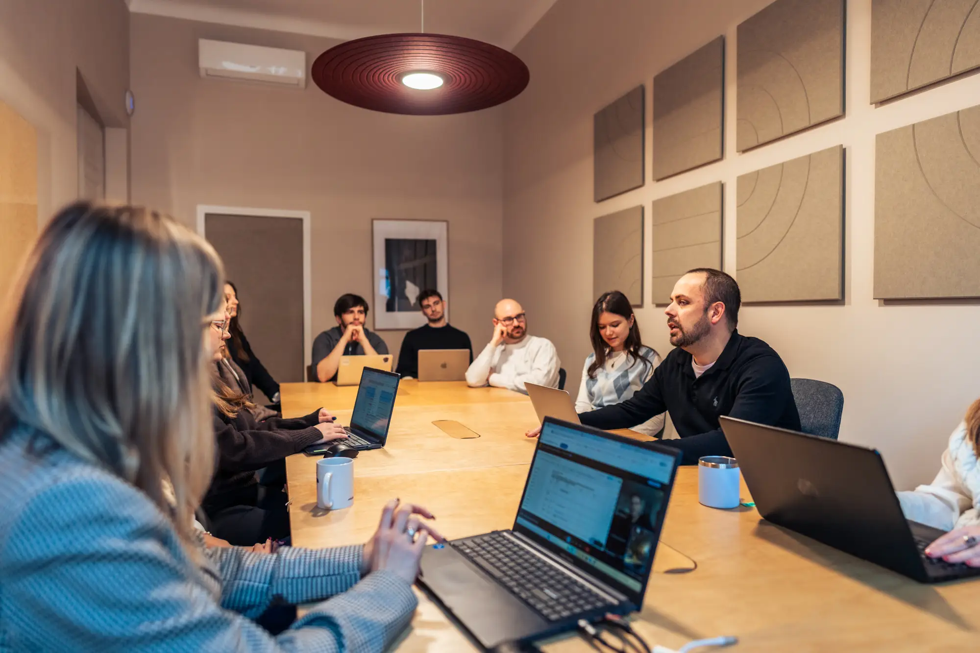 Meeting room at Yolk Coworking Kraków with 4K screen and professional setup
